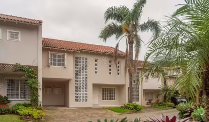 Casa em condomínio fechado com 4 quartos à venda na Rua Conrado Ferrari, 71, Jardim Isabel, Porto Alegre por R$ 950.000