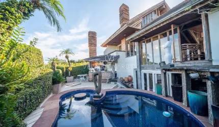 Casa com 4 quartos à venda na Rua Edgar Luiz Schneider, 15, Jardim Isabel, Porto Alegre por R$ 1.300.000
