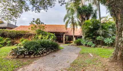 Casa em condomínio fechado com 4 quartos à venda na Avenida da Cavalhada, 5205, Cavalhada, Porto Alegre por R$ 2.500.000