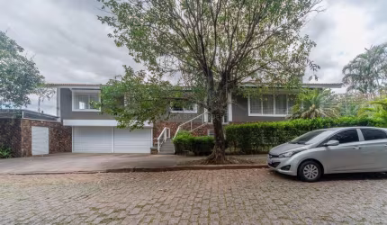 Casa com 3 quartos à venda na Rua Morano Calabro, 570, Jardim Isabel, Porto Alegre por R$ 1.600.000