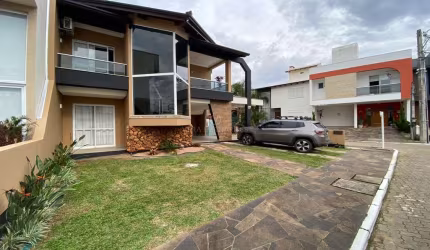 Casa em condomínio fechado com 3 quartos à venda na Rua Eroni Soares Machado, 300, Hípica, Porto Alegre por R$ 900.000
