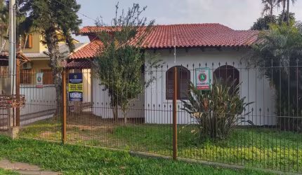 Casa com 4 quartos à venda na Avenida Guarujá, 199, Guarujá, Porto Alegre por R$ 640.000