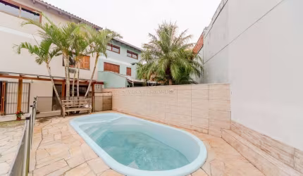 Casa com 3 quartos à venda na Rua Torre de Pedra, 78, Espírito Santo, Porto Alegre por R$ 980.000