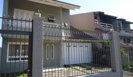 Casa com 4 quartos à venda na Rua Professor Antônio José Remião, 40, Espírito Santo, Porto Alegre por R$ 850.000