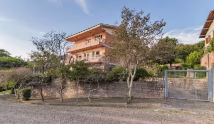 Casa com 4 quartos à venda na Rua Caeté, 1047, Vila Assunção, Porto Alegre por R$ 1.990.000