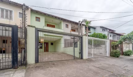 Casa com 3 quartos à venda na Rua Claudio da Silva Pinto, 72, Espírito Santo, Porto Alegre por R$ 695.000