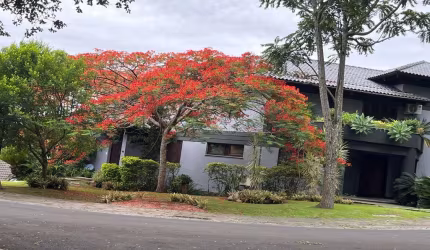 Casa em condomínio fechado com 5 quartos à venda na Avenida da Cavalhada, 5205, Cavalhada, Porto Alegre por R$ 4.800.000