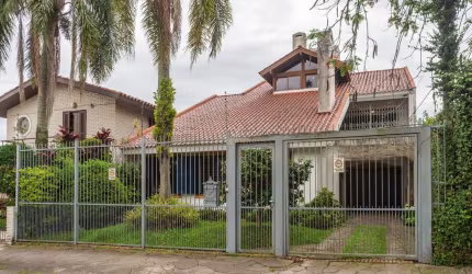 Casa com 4 quartos à venda na Rua Engenheiro Coelho Parreira, 520, Ipanema, Porto Alegre por R$ 1.200.000