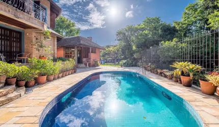 Casa em condomínio fechado com 5 quartos à venda na Rua Professor Carlos de Paula Couto, 505, Cavalhada, Porto Alegre por R$ 6.000.000
