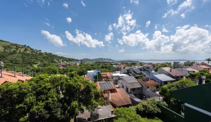 Casa com 4 quartos à venda na Rua Josué Guimarães, 255, Espírito Santo, Porto Alegre por R$ 950.000