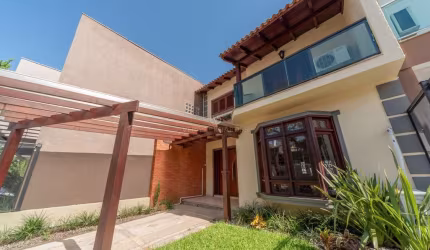 Casa com 3 quartos à venda na Rua Roberto Santini, 194, Hípica, Porto Alegre por R$ 650.000