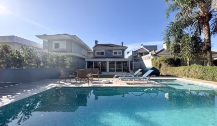 Casa em condomínio fechado com 3 quartos à venda na Avenida Juca Batista, 8000, Belém Novo, Porto Alegre por R$ 1.987.000
