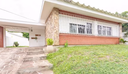 Casa em condomínio fechado com 3 quartos à venda na Rua Carlos Júlio Becker, 52, Tristeza, Porto Alegre por R$ 1.250.000