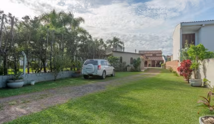 Casa com 5 quartos à venda na Rua Stringhini, 3, Hípica, Porto Alegre por R$ 890.000