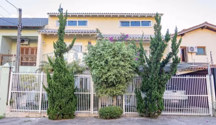 Casa com 4 quartos à venda na Rua Ancara, 381, Espírito Santo, Porto Alegre por R$ 960.000