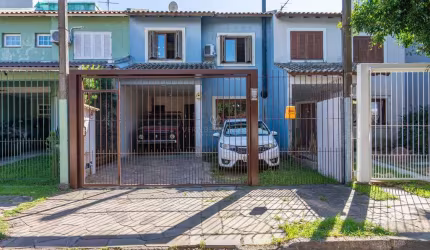 Casa com 3 quartos à venda na Rua Rodolpho Espinoza, 47, Hípica, Porto Alegre por R$ 600.000