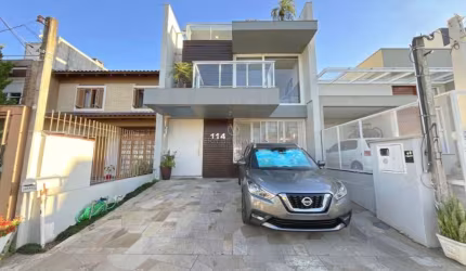 Casa em condomínio fechado com 3 quartos à venda na Rua Aldo Sani, 114, Hípica, Porto Alegre por R$ 890.000