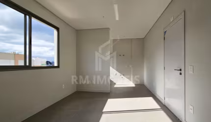 Apartamento novo de 1 dormitório, com 1 vaga de garagem, sol da tarde, e vista livre, a poucos metros da UFSC!