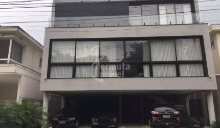 Edifício Reserva Alphasítio - Casa à venda com 500m², 4 suítes, sala de estar, cozinha, área de lazer e garagem no Condomínio Alphasitio