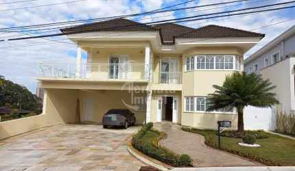 Residencial Melville - Casa com 669m², 4 suítes, escritório, piscina e espaço gourmet no Melville
