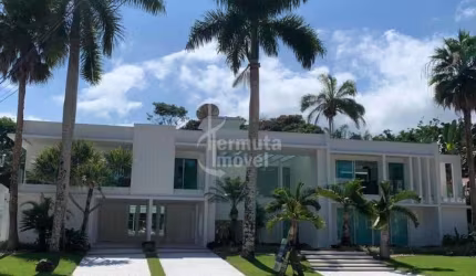 Mansão com 1035 m², 6 suítes, living para 3 ambientes, pé direito duplo, sala de cinema, no Riviera de São Lourenço