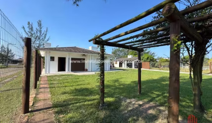 Casa com 2 dormitórios à venda, 140 m² por R$ 650.000,00 - Village Dunas - Balneário Gaivota/SC