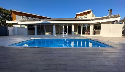 Casa com 5 dormitórios à venda, 430 m² por R$ 4.950.000,00 - Condomínio Vale do Sol - Tremembé/SP