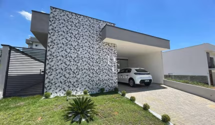 Casa com 3 dormitórios à venda, 144 m² por R$ 720.000,00 - Condomínio Vale dos Cristais - Taubaté/SP