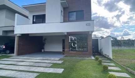 Casa com 3 dormitórios à venda, 202 m² por R$ 870.000,00 - Condomínio Vale dos Cristais - Taubaté/SP