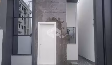 CASA À VENDA EM TIJUCAS - 2 DORMITÓRIOS, 1 SUÍTE E PÉ DIREITO ALTO