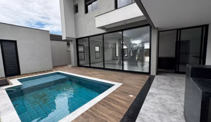 Maravilhoso sobrado com 4 suítes ,com piscina aquecida