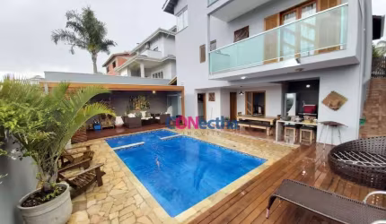 Casa com 4 dormitórios, 250 m² - venda por R$ 1.850.000 ou aluguel por R$ 8.810/mês ( Pacote ) - Condomínio Itatiba Country Club - Itatiba/SP
