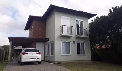 Casa em condomínio fechado com 3 quartos à venda no Farroupilha, Osório  por R$ 1.300.000