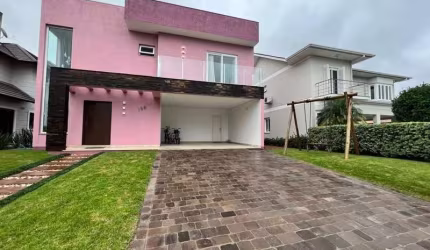 Casa em condomínio fechado com 3 quartos à venda no Farroupilha, Osório  por R$ 1.435.000