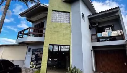 Casa com 3 quartos à venda no Porto Lacustre, Osório  por R$ 900.000