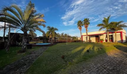 Casa em condomínio fechado com 3 quartos à venda no Palmital, Osório  por R$ 1.100.000