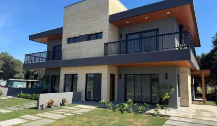 Casa em condomínio fechado com 3 quartos à venda na Lagoa do Peixoto, Osório  por R$ 1.250.000