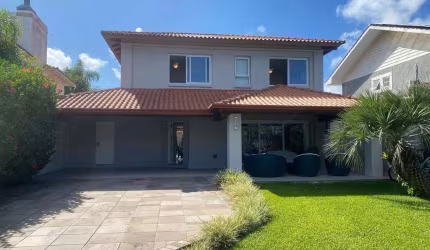 Casa em condomínio fechado com 4 quartos à venda na Rua Paralelo Norte, 867, Atlântida, Xangri-Lá por R$ 2.960.000