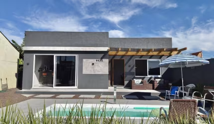Casa com 4 quartos à venda na Rua Âmbar, 1135, Rainha do Mar, Xangri-Lá por R$ 625.000