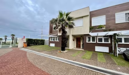 Casa em condomínio fechado com 4 quartos à venda na Rua Irerê, 37, Atlântida, Xangri-Lá por R$ 3.200.000