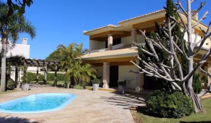 Casa com 6 quartos à venda na Rua Camaquã, 419, Remanso, Xangri-Lá por R$ 2.000.000