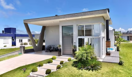 Casa em condomínio fechado com 4 quartos à venda na Rua Onório Germano, 2009, Araça, Capão da Canoa por R$ 1.790.000