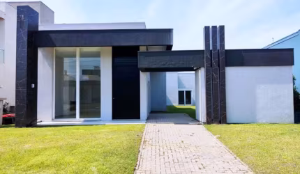 Casa em condomínio fechado com 4 quartos à venda na Rua Onório Germano, 2009, Araça, Capão da Canoa por R$ 1.450.000