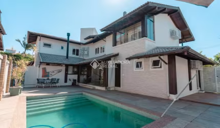 Casa com 4 quartos à venda na Rua dos Tucunarés, 30, Jurerê Internacional, Florianópolis, 520 m2 por R$ 6.900.000