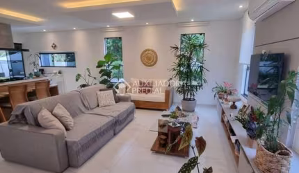 Casa em condomínio fechado com 4 quartos à venda na Rua Leonel Pereira, 2033, Cachoeira do Bom Jesus, Florianópolis, 235 m2 por R$ 2.350.000