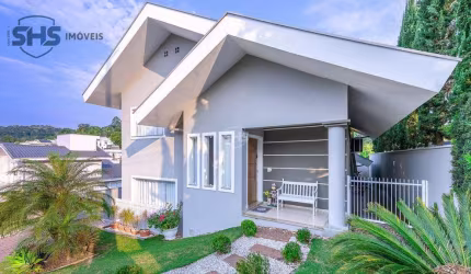 Casa em condomínio fechado com 3 dormitórios à venda, 214 m² por R$ 1.699.000