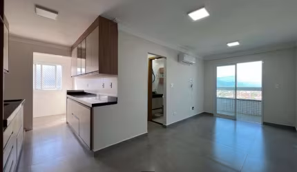 Apartamento à venda em Praia Grande-SP, bairro Real: 1 quarto, 1 sala, 1 banheiro, 1 vaga de garagem, 54,00 m².