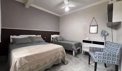 Imperdível! Casa à venda em Praia Grande-SP, bairro Real, 3 quartos, 3 suítes, 1 sala, 4 banheiros, 3 vagas de garagem, 118m²!