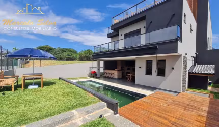 ESTILO  RÚSTICA MODERNA, CASA 4 DORMITÓRIOS ,   CONDOMÍNIO ALTO PADRÃO COM SISTEMA CLUBE