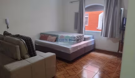 Apartamento a venda na Vila Tupi, a 50 metros da praia. 1 quarto, 1 banheiro, 1 garagem